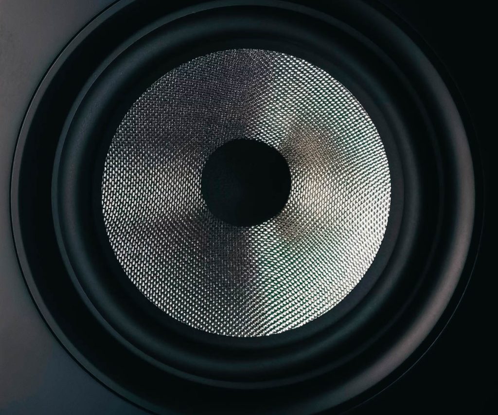 A close up of an old speaker